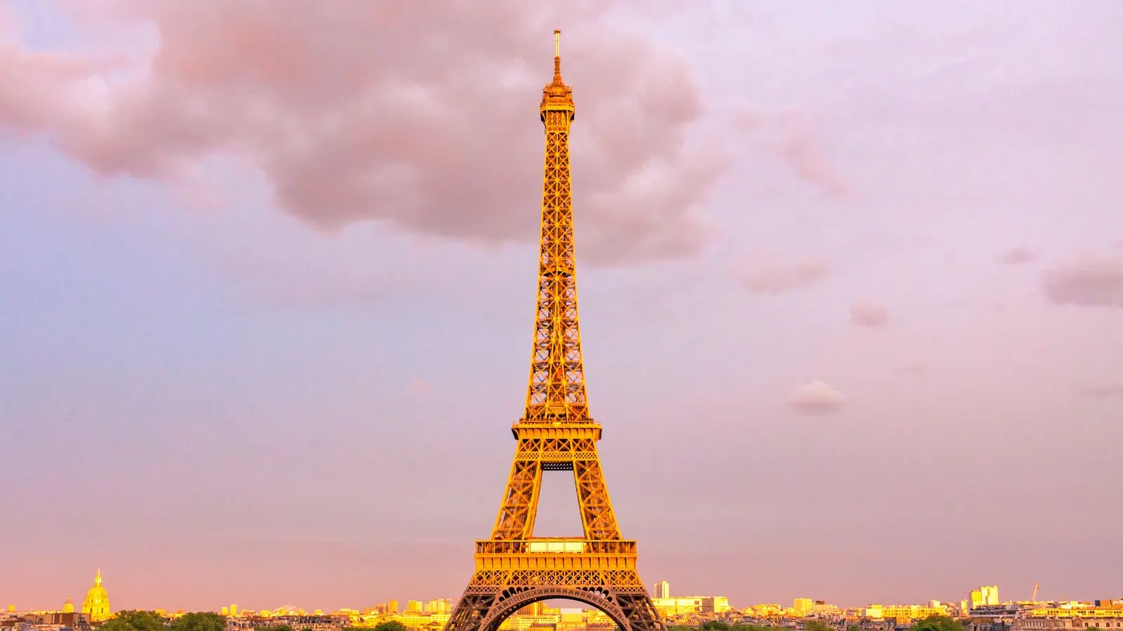The Eiffel Tower over Paris at sunset, France